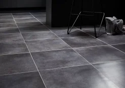GoodHome Carrelage Sol Pour Pièce À Vivre|Carrelage Mural Effet Béton<Carrelage sol anthracite effet béton L.42,6 x l.42,6 cm x ép.7,4 mm, Konkrete