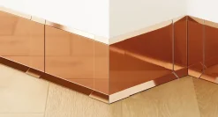 Ilcom Moulure<Coin extérieur pour plinthe FL Cuivre poli - 30mm x 100 mm x 0,65 ep.