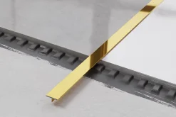 Ilcom Profilé Carrelage<Couvre-joint profilé décoratif Ts en inox rectifié Or poli - 15mm x 2440mm x 0,65 ep.