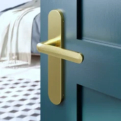 GoodHome Poignée De Porte<Ensemble poignée sur plaque rond Garlan effet laiton satin doré L.125mm x l.42mm entraxe 165-195mm