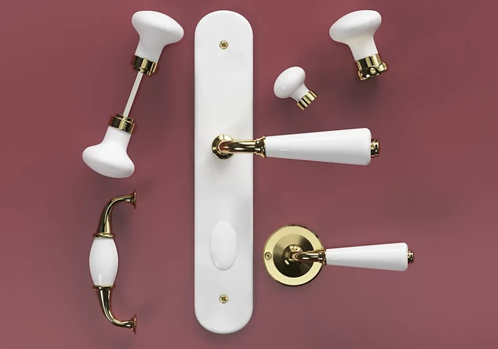 GoodHome Ensemble poignée sur rosace Incurvé vis traversante ou à vis Porcelaine Vras brillant or Ø48mm- Poignée De Porte